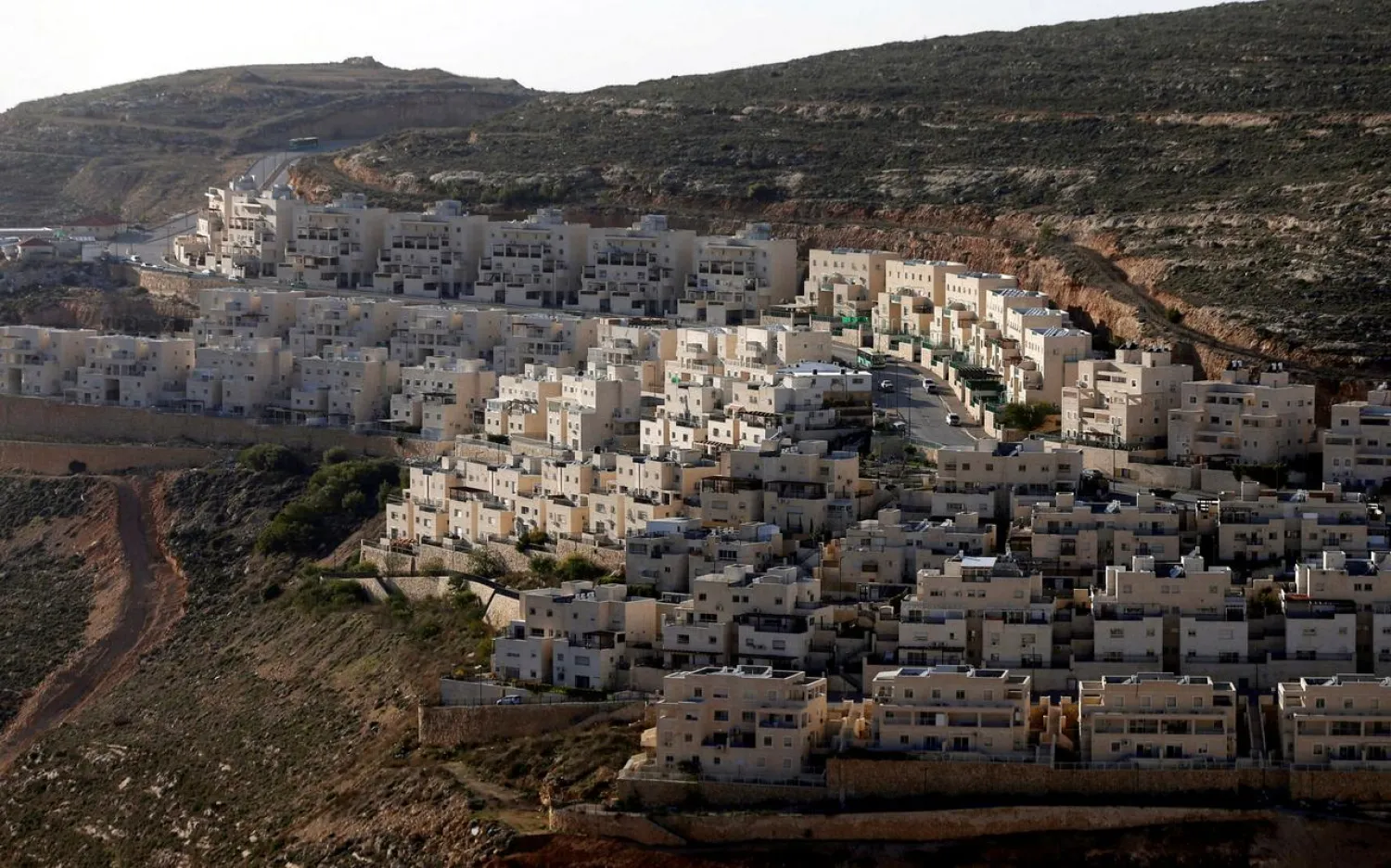 General view of houses of the Israeli settlement of Givat Ze'ev, in the occupied West Bank February 7, 2017. REUTERS/Ammar Awad/File Photo 