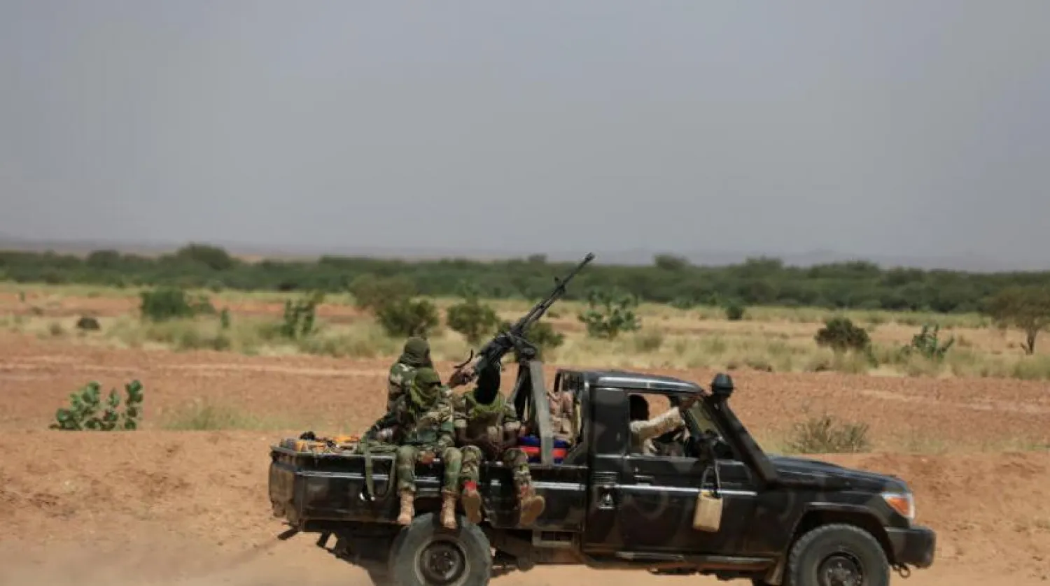 Niger army trucks ride on a small truck. Reuters file photo