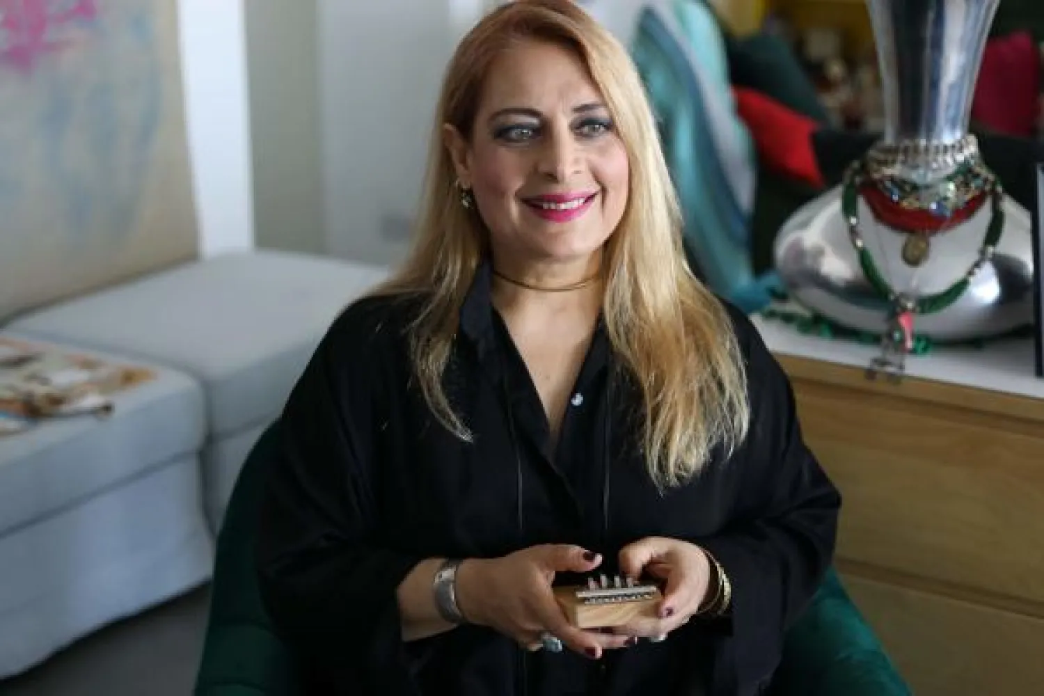 Cypriot singer Alexia Vassiliou speaks during an interview with AFP in Nicosia on July 29, 2020. (Photo by Christina ASSI / AFP)