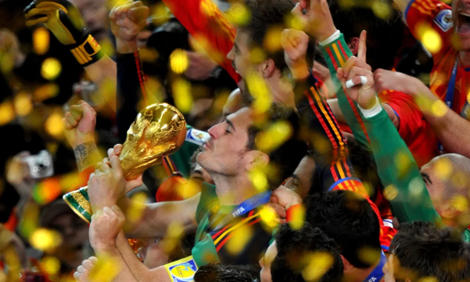 Iker Casillas kisses the trophy after Spain’s 2010 World Cup final victory over the Netherlands. Photograph: Roberto Schmidt/AFP/Getty Images