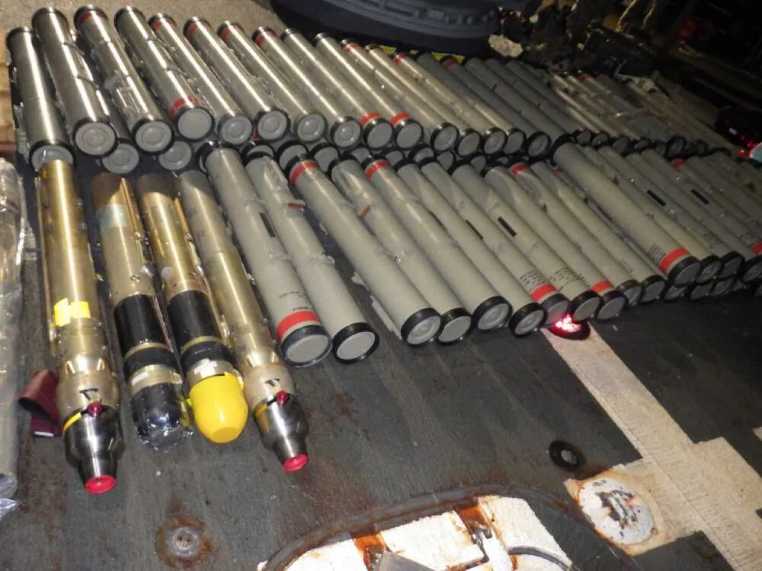 The crew of the USS Normandy seized an illicit shipment of weapons components intended for the Houthis in Yemen, Feb. 9, 2020 (US Navy photo)
