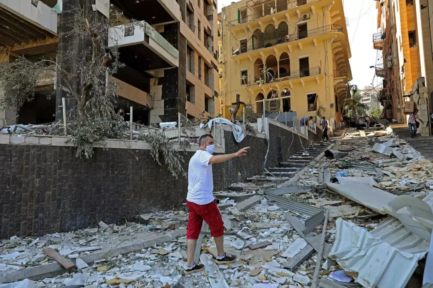 A man inspects the damage of the blast that tore through Lebanon's capital. (AFP)