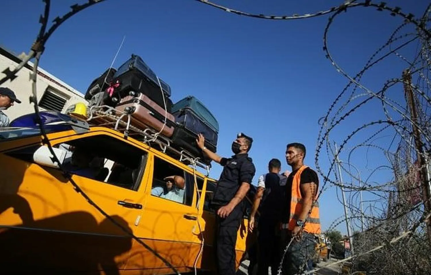 Palestinians prepare to cross from Gaza to Egypt as the border reopens for first time in months. AFP