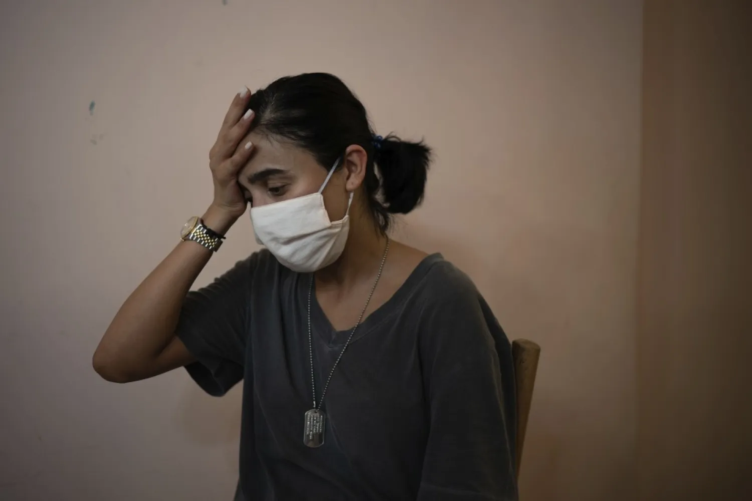 Rachelle Boumelhem reacts during an interview in her damaged beauty salon in Beirut, Lebanon, Monday, Aug. 10, 2020. Beirut's massive explosion last week is just the latest in multiple crises that have hit Lebanon the past year, including massive protests, economic collapse and the coronavirus pandemic. Some Lebanese, whether poor or middle class, now feel their resolve is simply broken. (AP Photo/Felipe Dana)