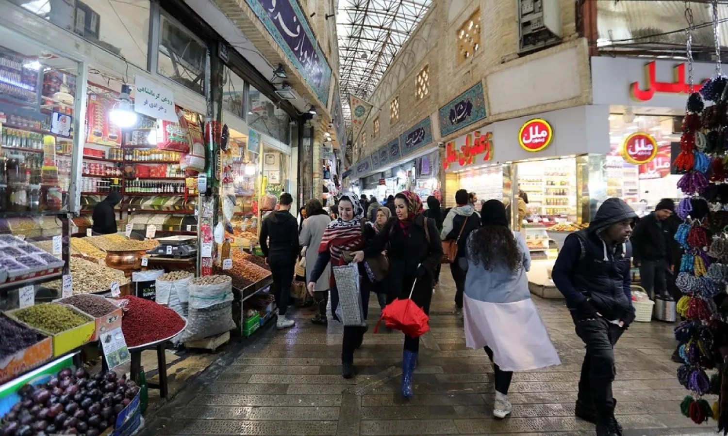 Iranians shop in the Tajrish Bazaar in Tehran in November 2019. (AFP)
