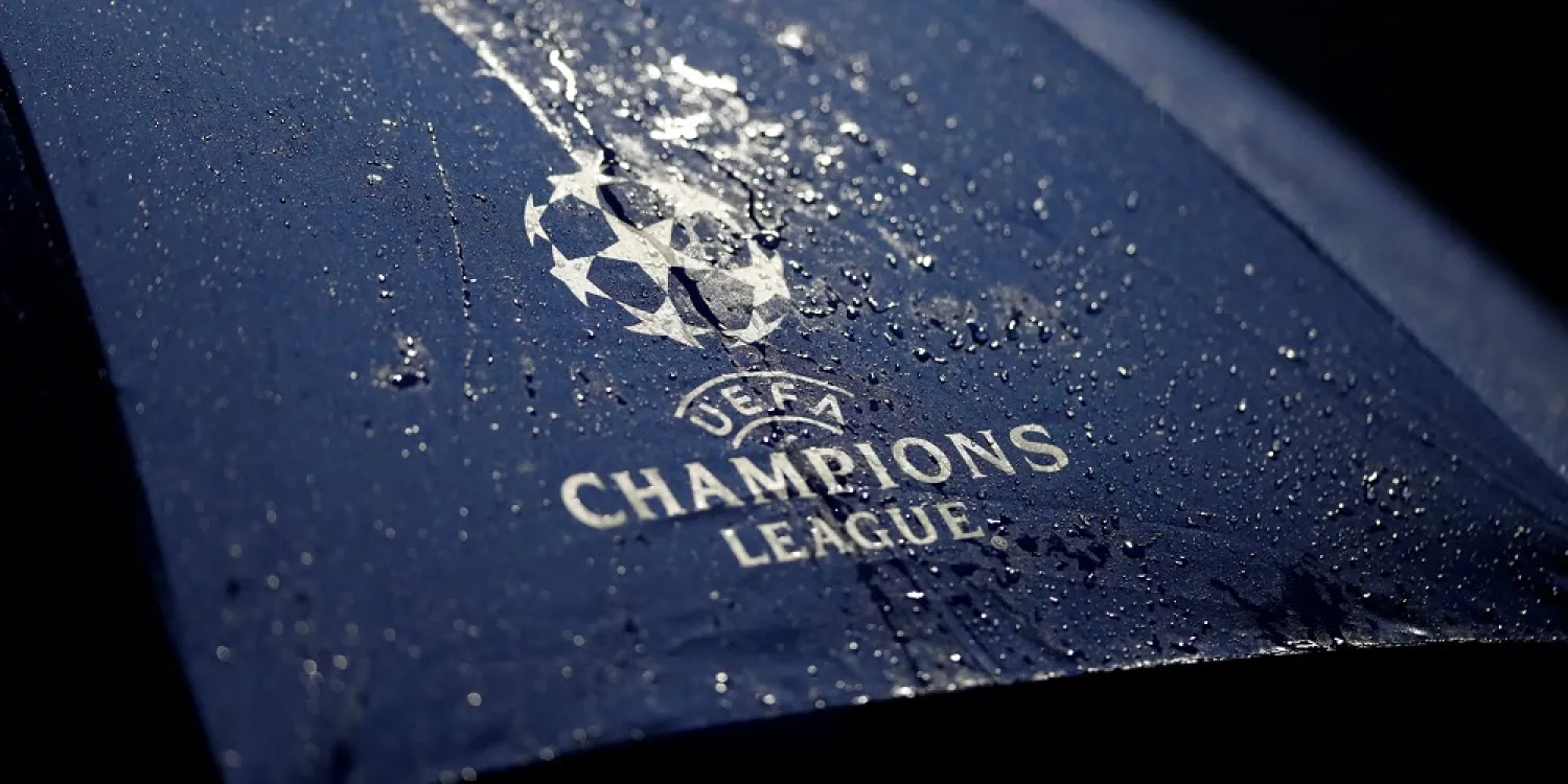 The Champions League logo is seen on an umbrella. (Reuters)