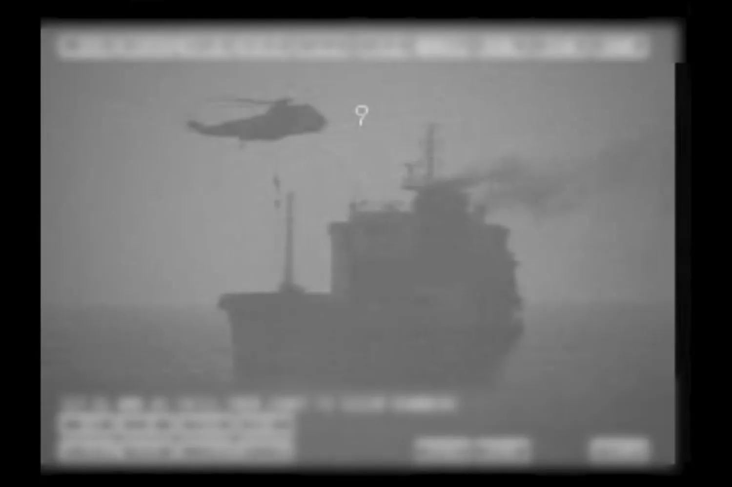 In this image made from video released by the US military's Central Command, Iranian commandos fast-rope down from a helicopter onto the MV Wila oil tanker. Aug. 12, 2020. AP