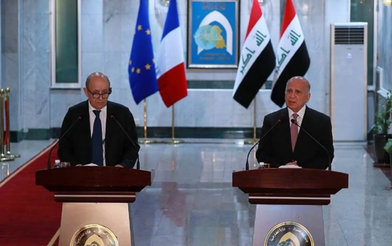 French Foreign Minister Jean-Yves Le Drian and his Iraqi counterpart Fuad Hussein (AP)