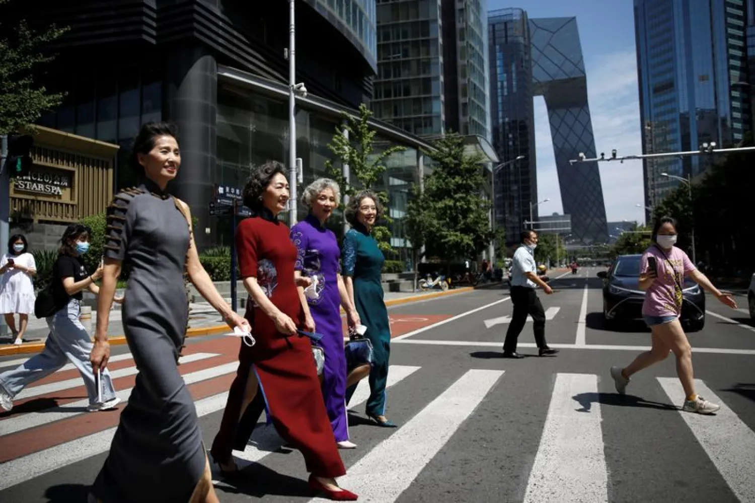 Four famous amateur model grandmothers took off their masks during a saunter down the streets of Beijing on Thursday to demonstrate life returning to normal as the COVID-19 pandemic eases.
Image Credit: Reuters