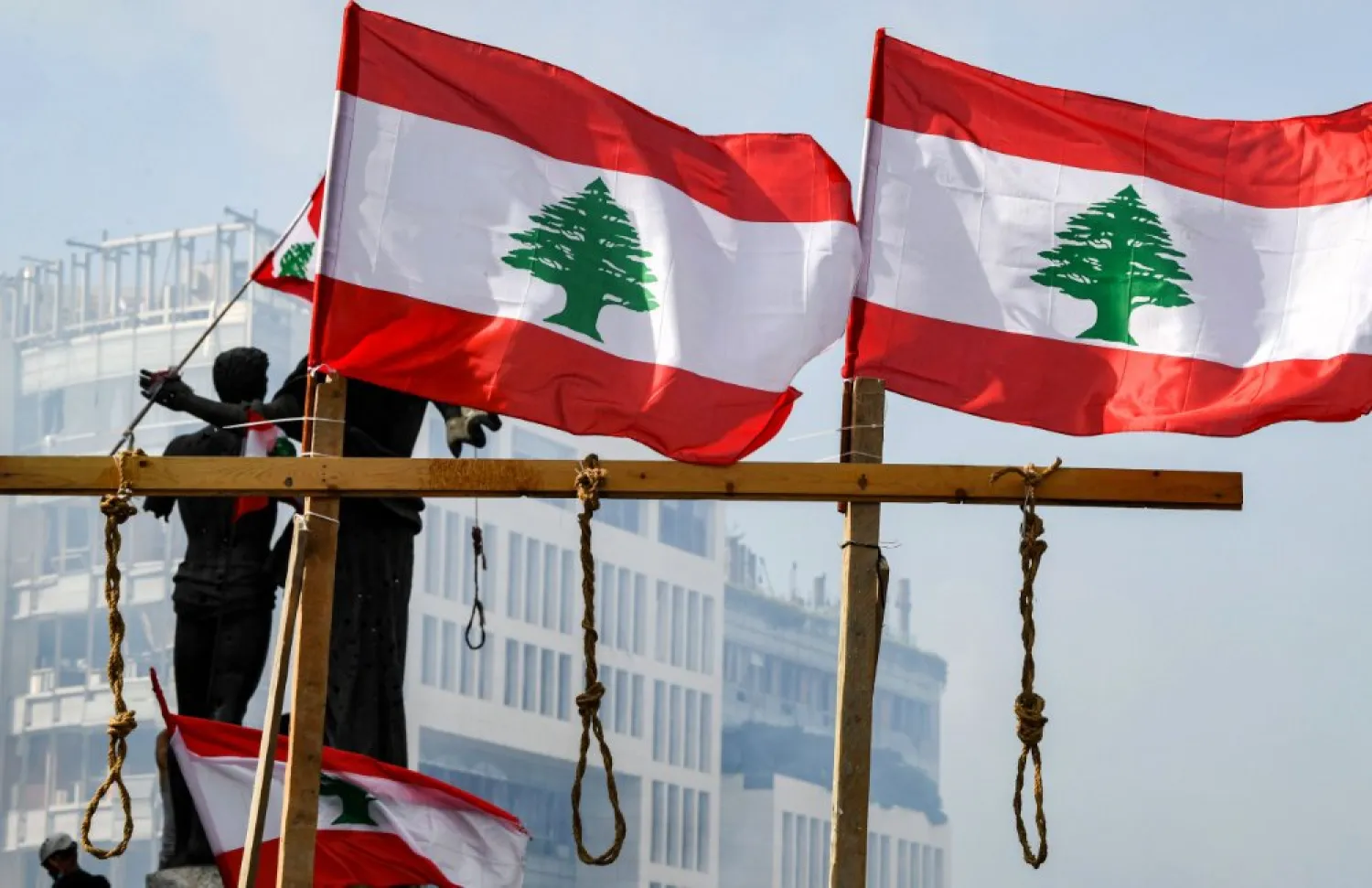 Lebanese protesters hang gallows in downtown Beirut on August 8, 2020, following a rally against a political leadership they blame for a monster explosion in capital Beirut. (AFP)