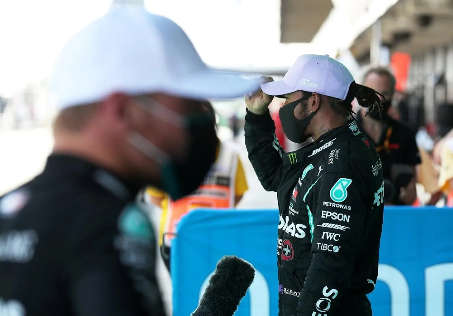 Lewis Hamilton talks to the press after qualifying in pole for the Spanish Grand Prix. (Reuters)
