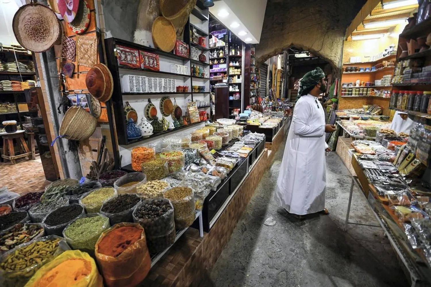 An Omani shopping at the souq in the city of Nizwa, about 160 kilometers southwest of the capital Muscat. (AFP)