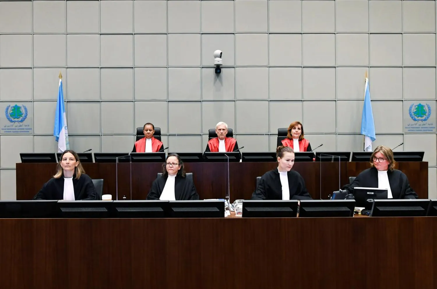 Judge David Re, Presiding Judge, Judge Janet Nosworthy, and Judge Micheline Braidy attend a session of the United Nations-backed Lebanon Tribunal handing down a judgment in the case of four men being tried in absentia for the 2005 bombing that killed former Prime Minister Rafik al-Hariri and 21 other people, in Leidschendam, Netherlands August 18, 2020. REUTERS/Piroschka Van De Wouw/Pool