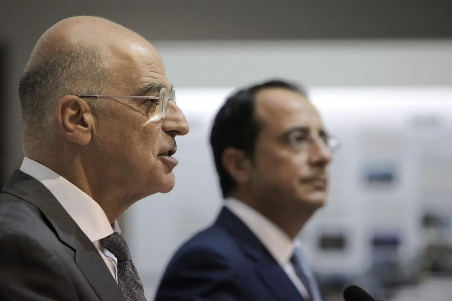 Greek FM Nikos Dendias, left, and Cyprus' FM Nikos Christodoulides talk during a press conference after their meeting at the Cyprus' foreign ministry in Nicosia, Cyprus, Aug. 18, 2020. (AP)