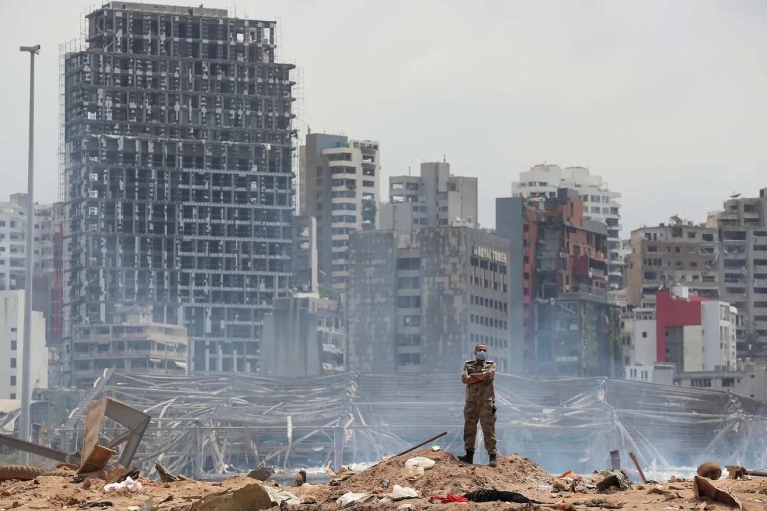 FILE PHOTO: A soldier stands at the devastated site of the explosion at the port of Beirut, Lebanon August 6, 2020. Thibault Camus/Pool via REUTERS/File Photo