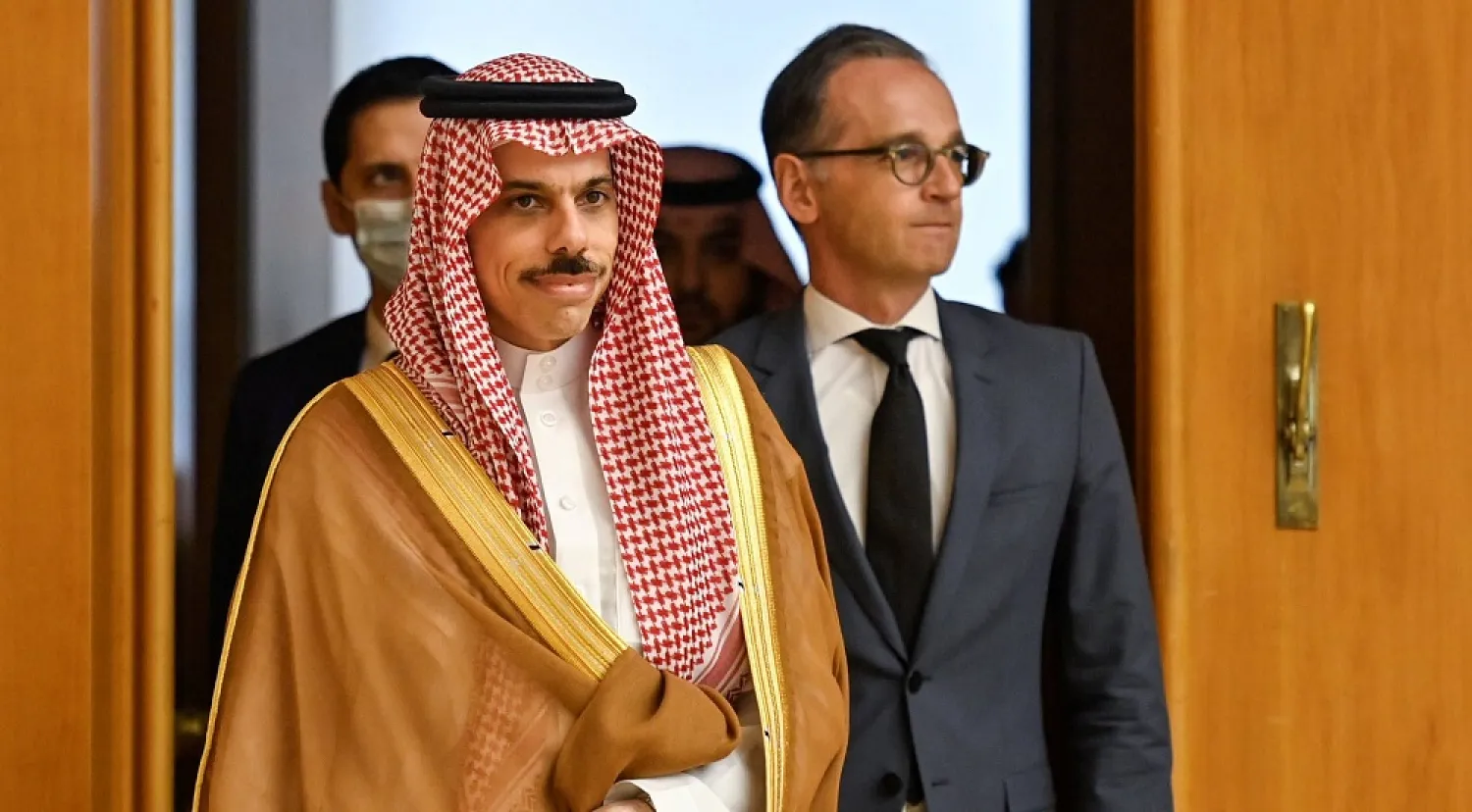 German Foreign Minister Heiko Maas and Saudi Foreign Minister Prince Faisal bin Farhan arrive for a joint news conference in Berlin, Germany August 19, 2020. (Reuters)