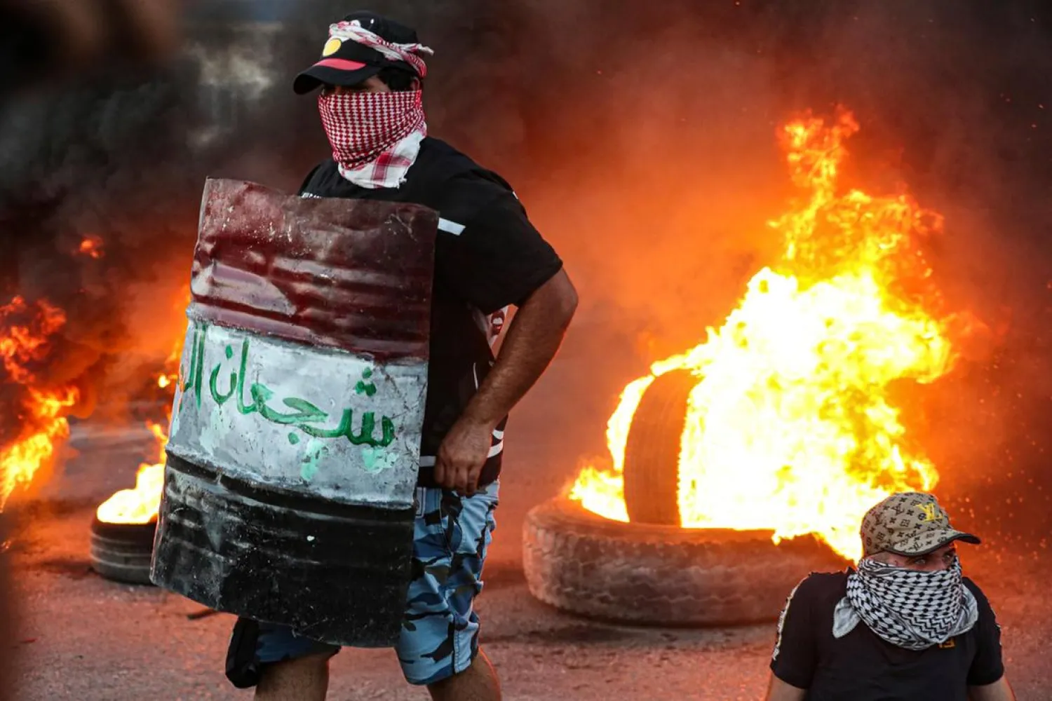 Protesters outside the provincial council building in Basra, Iraq. (AP)
