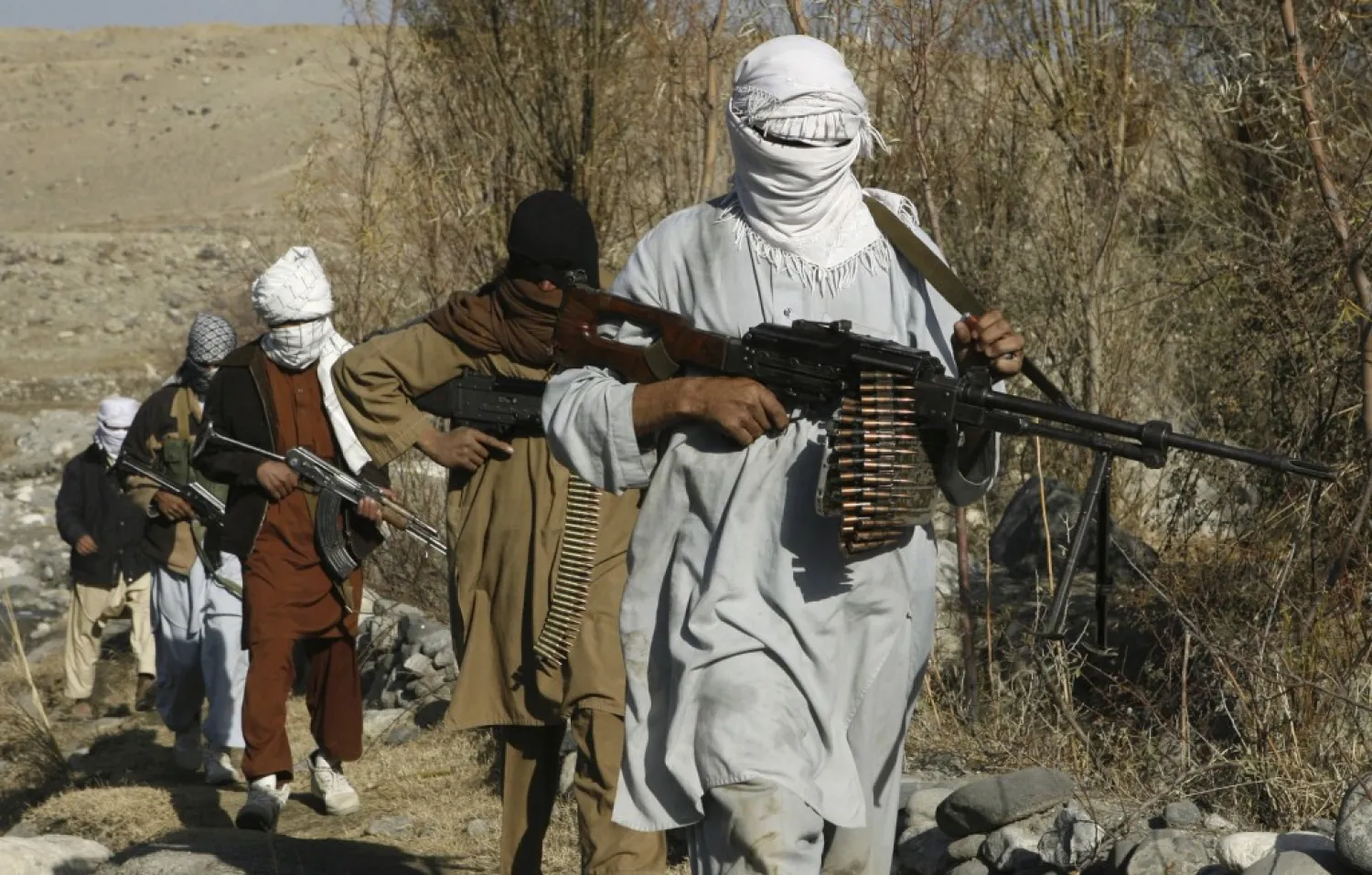 Taliban fighters pose with weapons in an undisclosed location in Nangarhar province in this December 13, 2010 picture. REUTERS/Stringer

