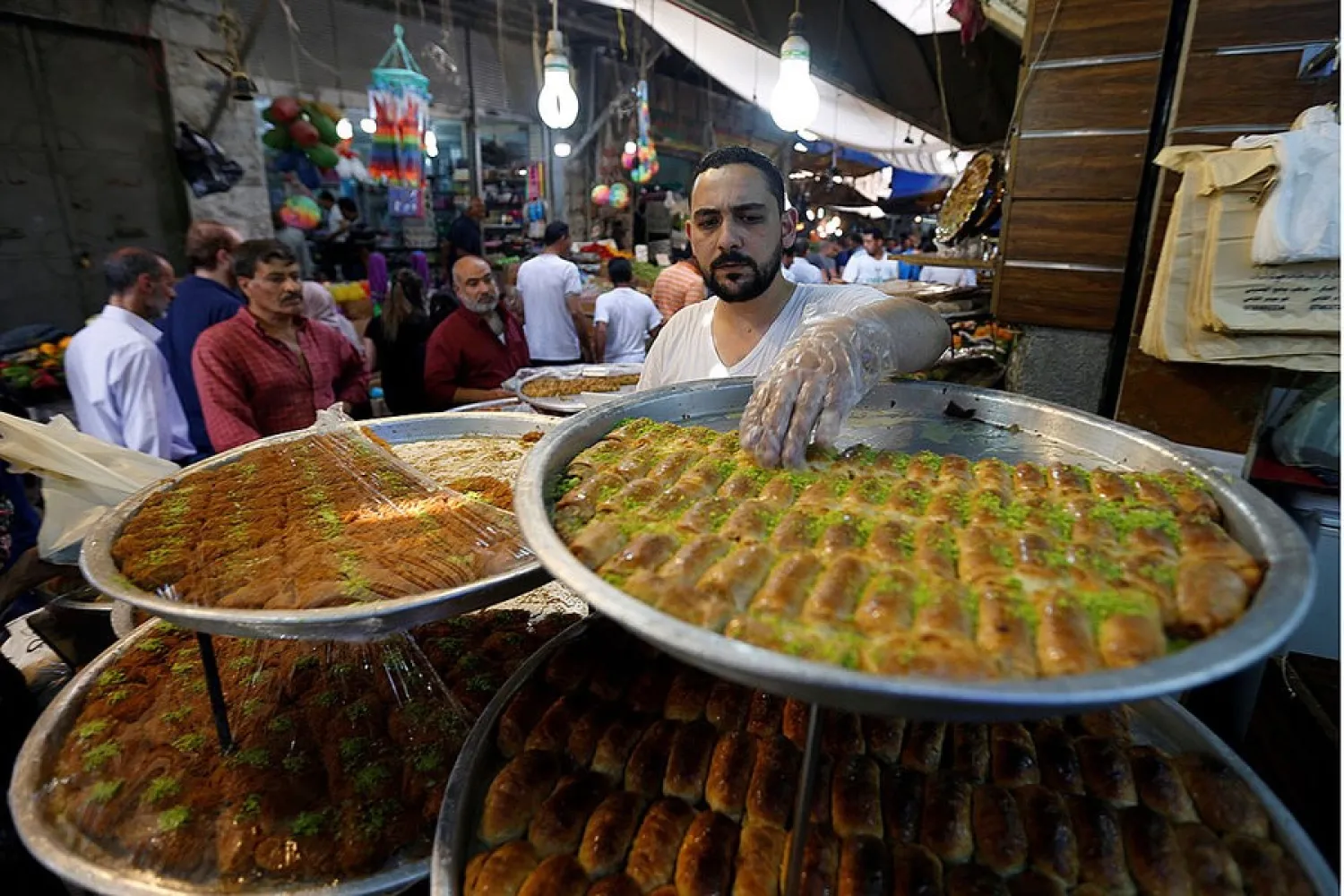A vendor displays sweets at a market in Amman, Jordan, in May. Muhammad Hamed/Reuters 