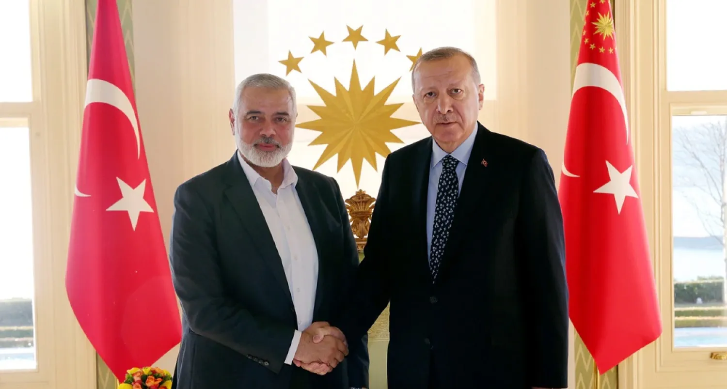 Turkey's President Recep Tayyip Erdogan, right, shakes hands with Hamas movement chief Ismail Haniyeh, prior to their meeting in Istanbul, Feb. 1, 2020. (AP)