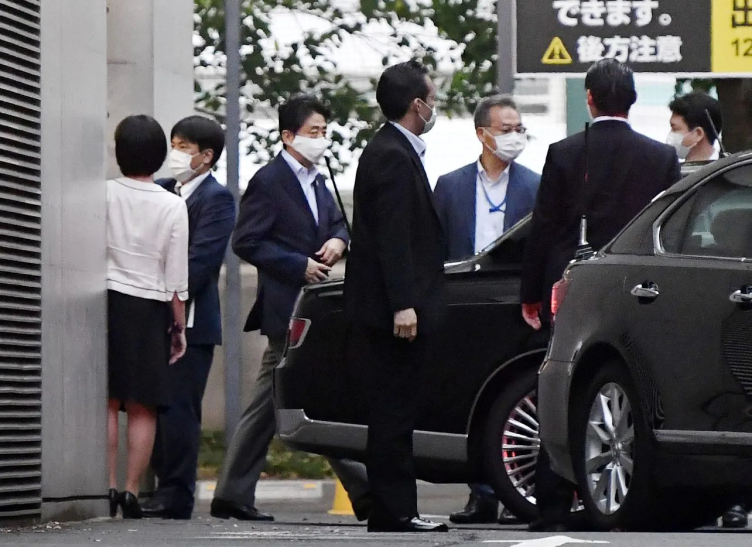 Japanese Prime Minister Shinzo Abe gets into a car as he leaves from Keio University Hospital in Tokyo, Japan, in this photo taken by Kyodo, August 17, 2020. Mandatory credit Kyodo/via REUTERS