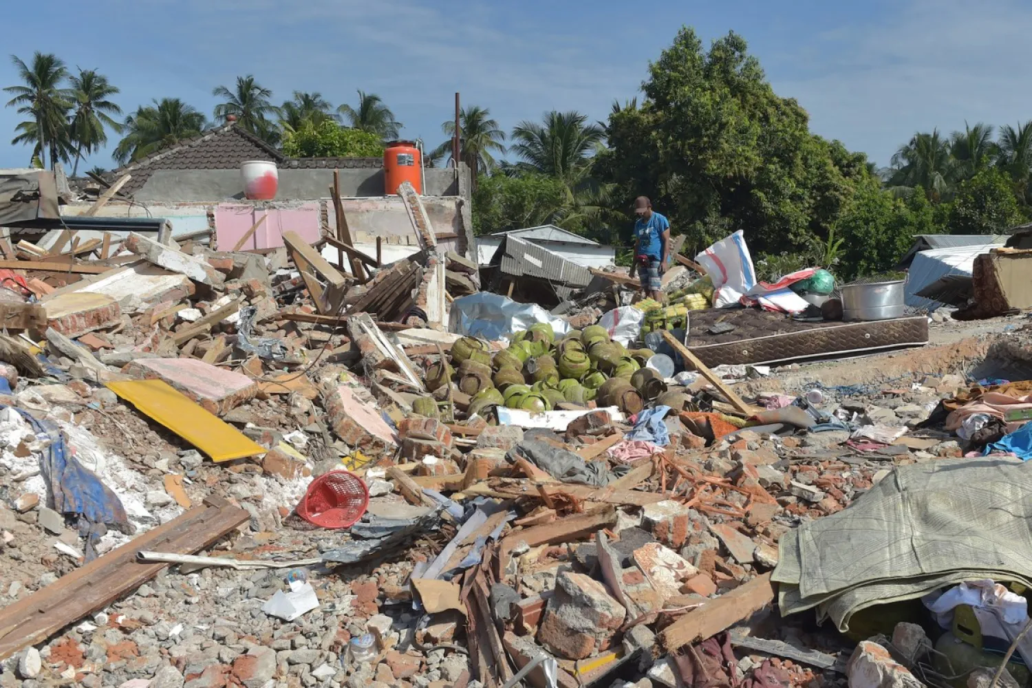 The shattered remnants of homes in Pemenang, northern Lombok, Indonesia following the Aug. 5 earthquake. Photo: AFP / Adek Berry
