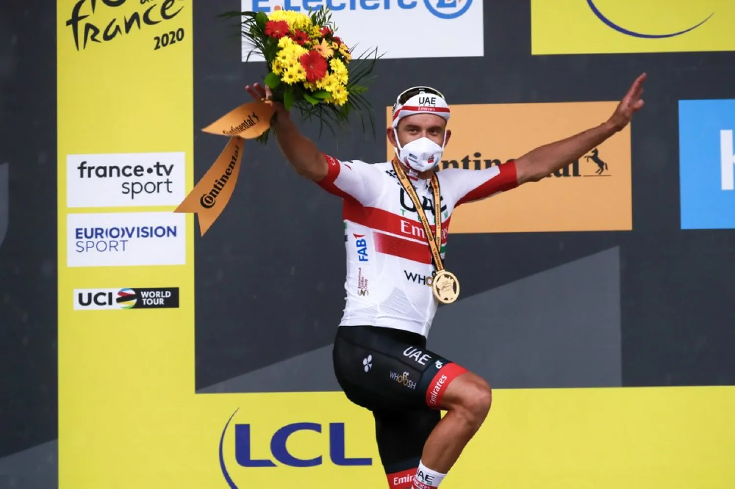 Alexander Kristoff celebrates on the podium after winning the first stage of the Tour de France cycling race with start and finish in Nice, southern France, Saturday, Aug. 29, 2020. (AP)