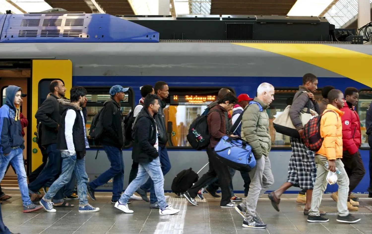 Migrants arrive at main railway station in Munich, Germany September 13, 2015. REUTERS/Michaela Rehle