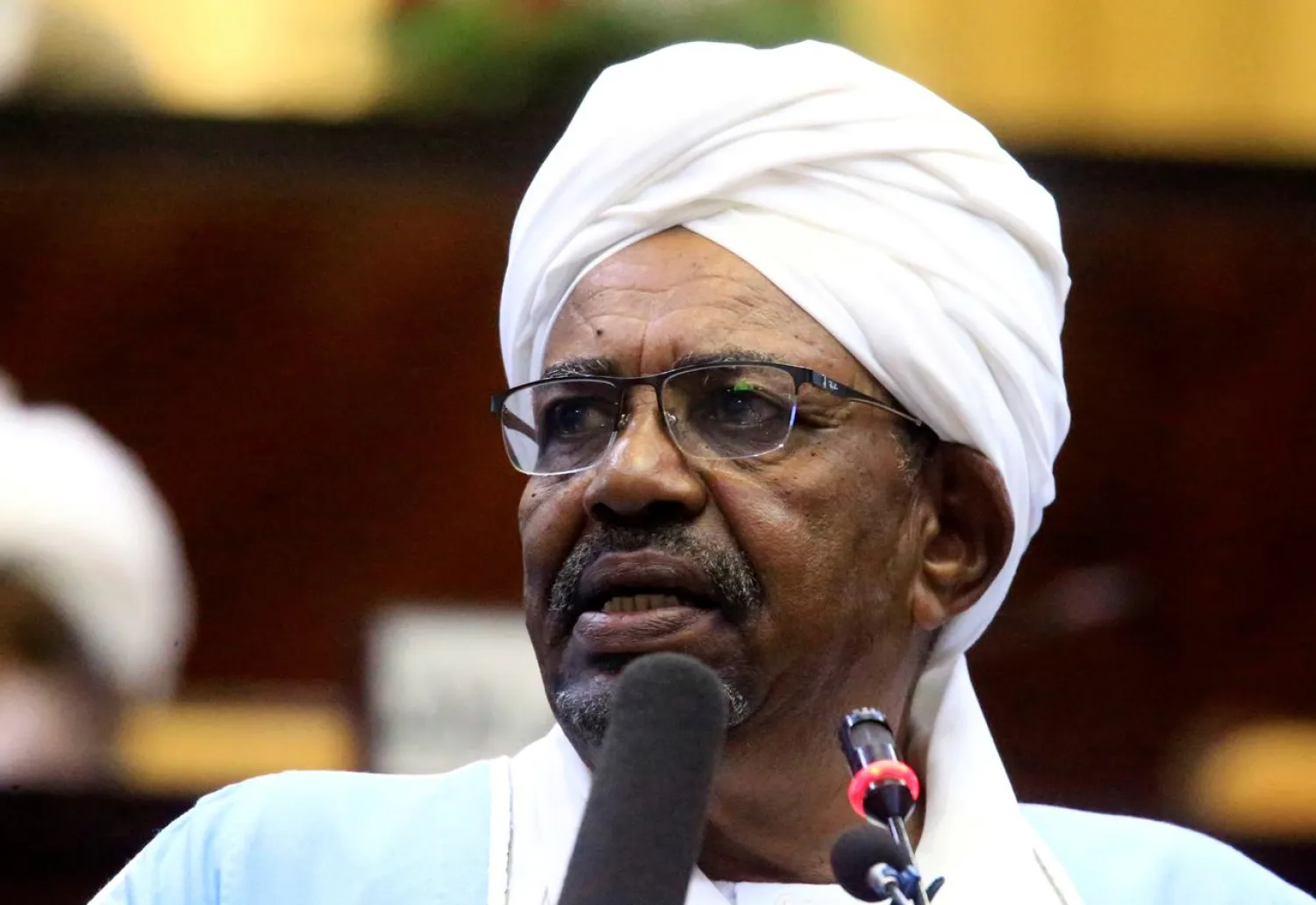 FILE PHOTO: Sudanese President Omar al-Bashir delivers a speech inside Parliament in Khartoum, Sudan April 1, 2019. REUTERS/Mohamed Nureldin Abdallah/File Photo
