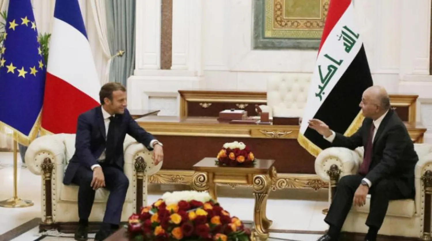 Macron Irak Cumhurbaşkanı Berhem Salih Fransa Cumhurbaşkanı Emmanuel Macron’u karşılarken (Reuters)