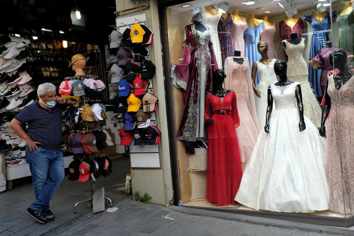 A shopkeeper waits for customers at Mahmutpasa street, a popular middle-class shopping district, in Istanbul, Turkey, July 28, 2020. (Reuters)