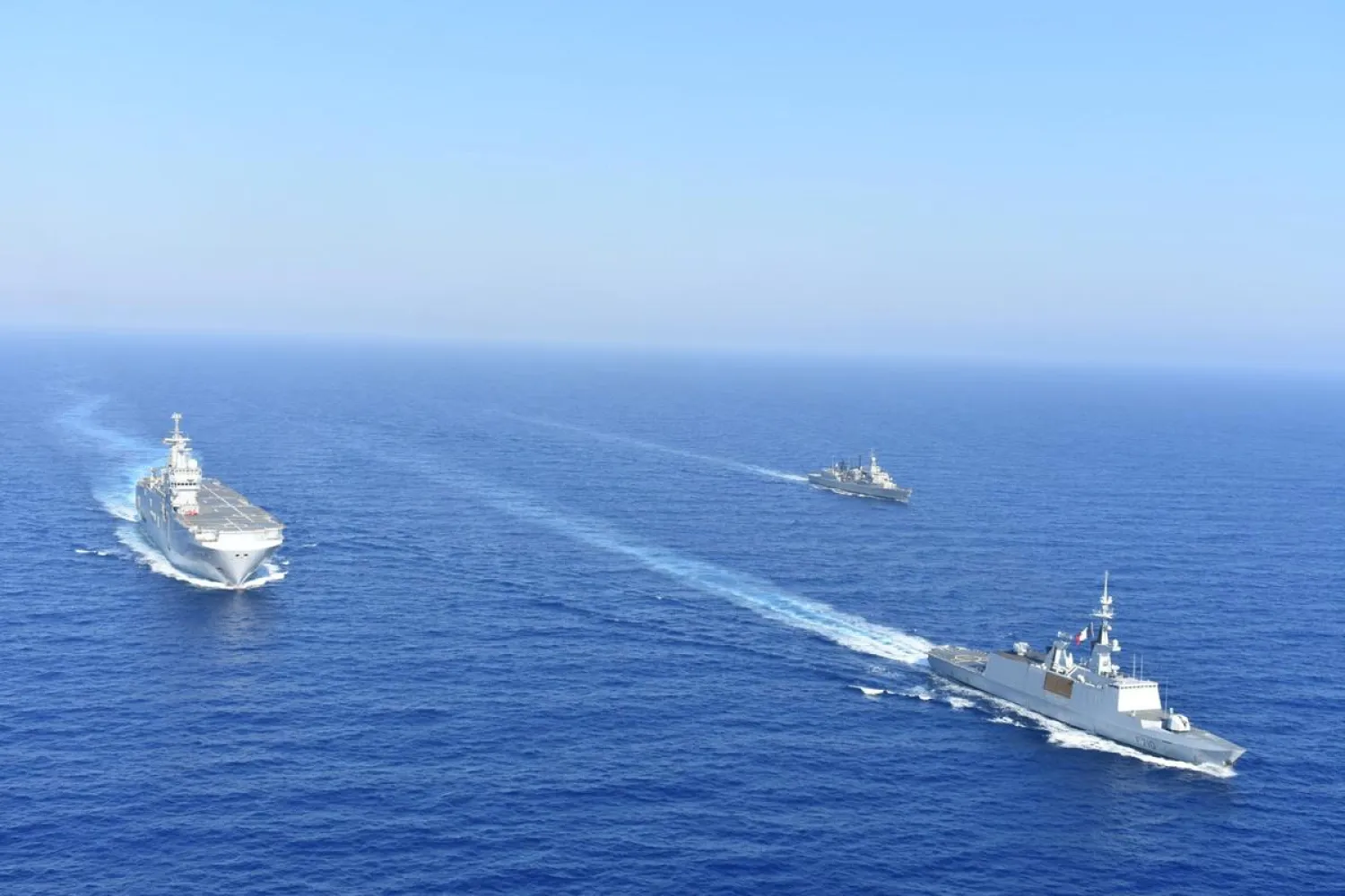 FILE PHOTO: Greek and French vessels sail in formation during a joint military exercise in Mediterranean sea, in this undated handout image obtained by Reuters on August 13, 2020. Greek Ministry of Defence/Handout via REUTERS
