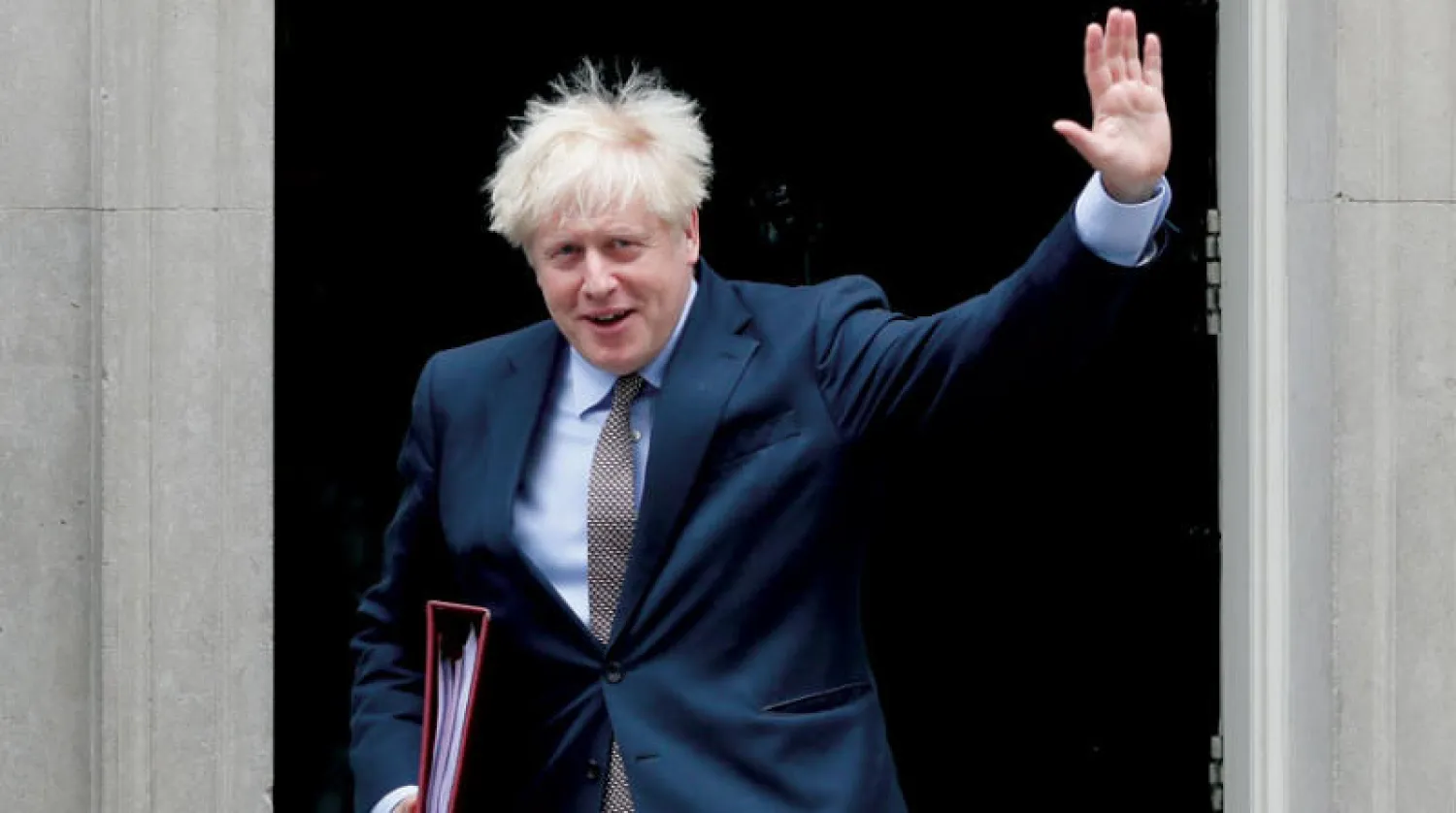 جونسون متوجهاً إلى مقر البرلمان أمس (أ.ب)