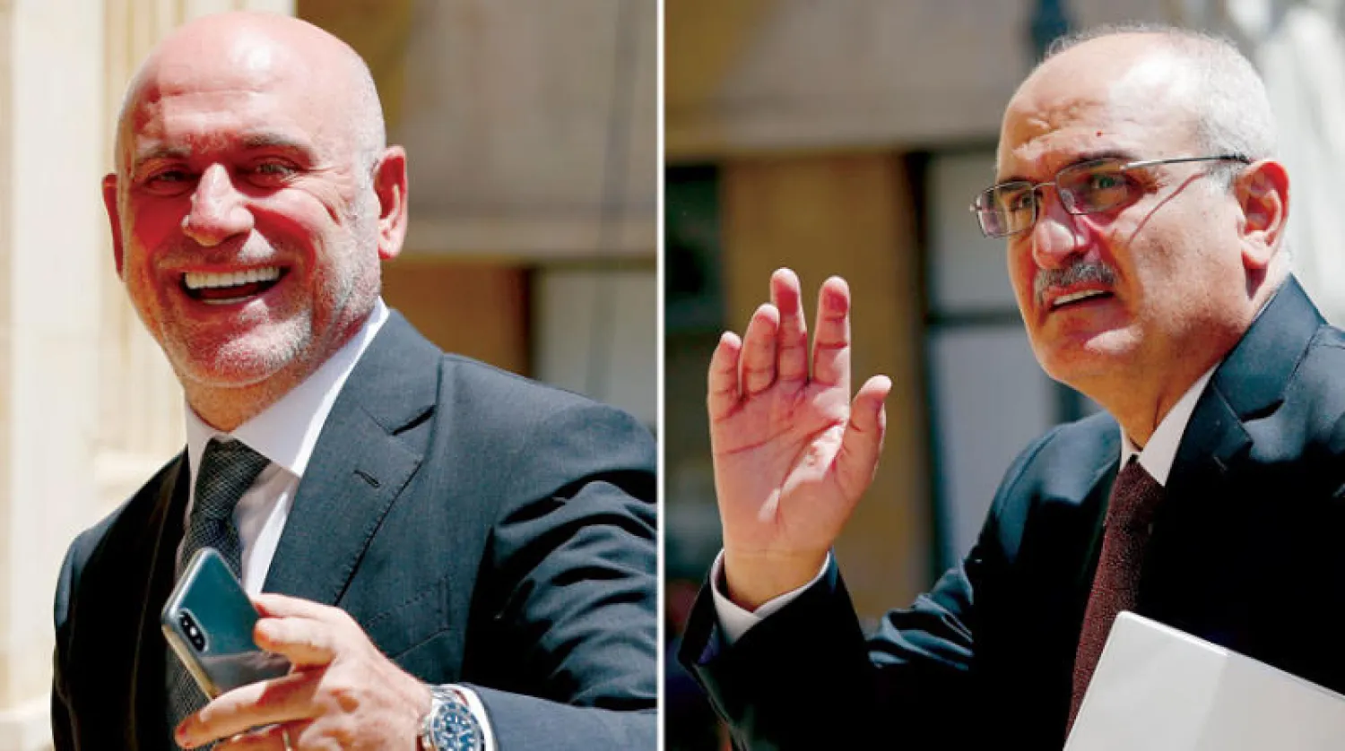 الوزيران السابقان علي حسن خليل (يمين) ويوسف فنيانوس (أ.ب)