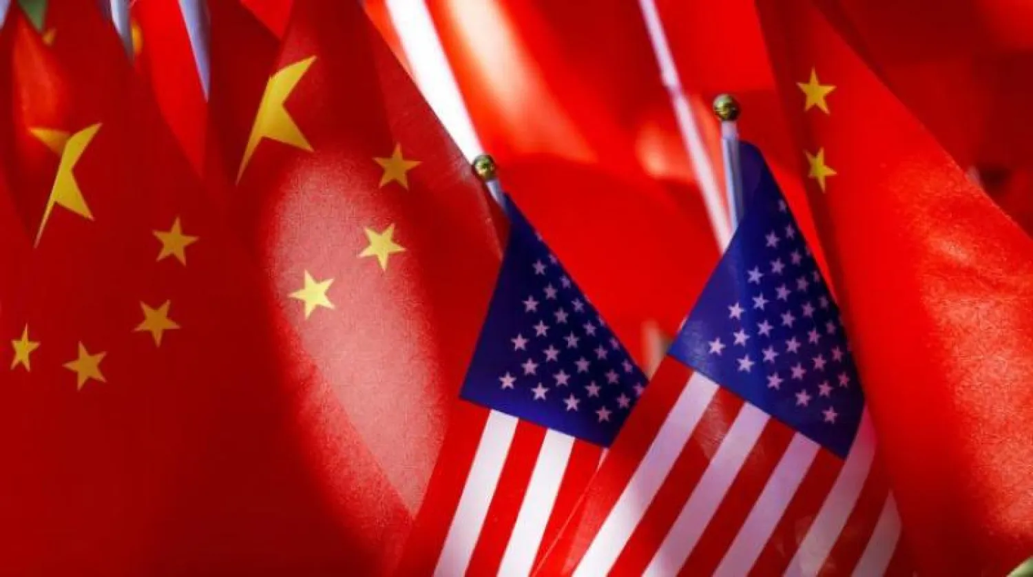 أعلام الصين والولايات المتحدة في بكين (أرشيفية - أ.ب)