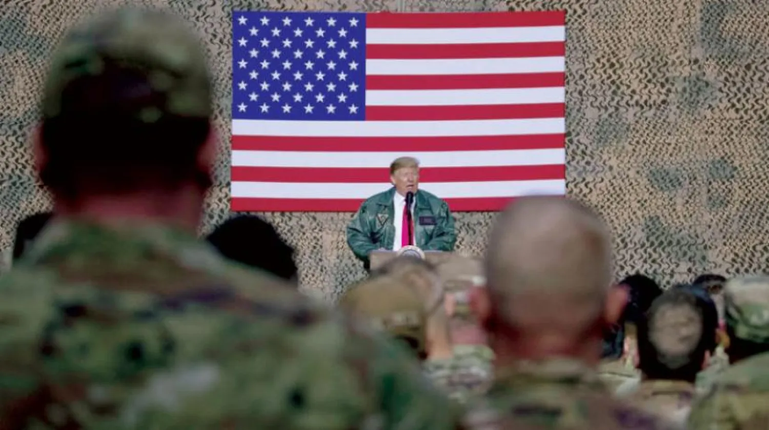 Trump’ın 2018 yılında Irak’taki Ayn El Esed Üssü’ndeki Amerikan askerlerini ziyareti sırasında (AP)