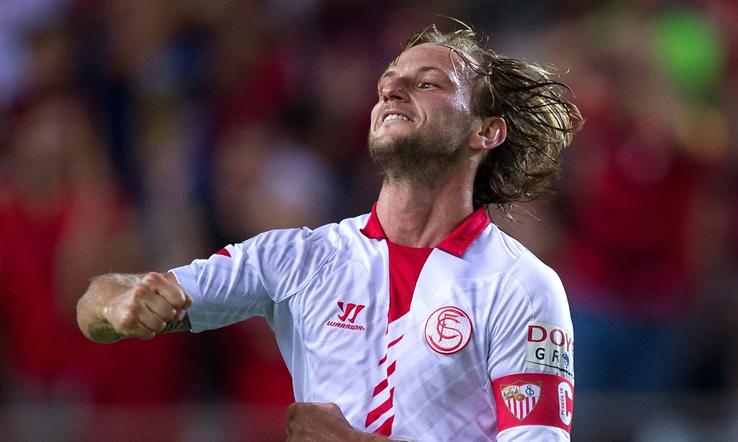 Ivan Rakitic celebrating a goal against Rayo Vallecano in September 2013, during his first spell at Sevilla. Photograph: Denis Doyle/Getty Images