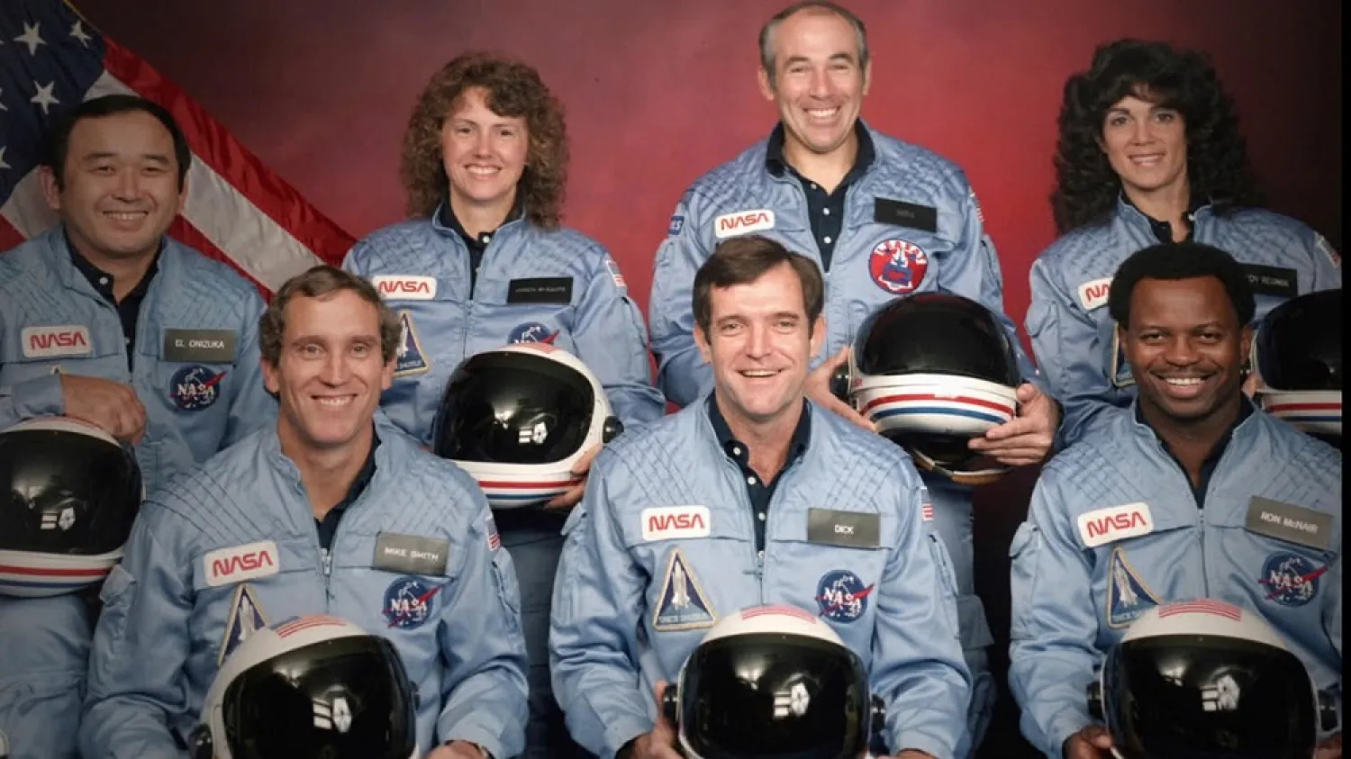This image released by Netflix shows members of the Challenger 7 crew, from left, Ellison S. Onizuka; Mike Smith; Christa McAuliffe; Dick Scobee; Gregory Jarvis; Judith Resnik; and Ronald McNair. (Netflix via AP)