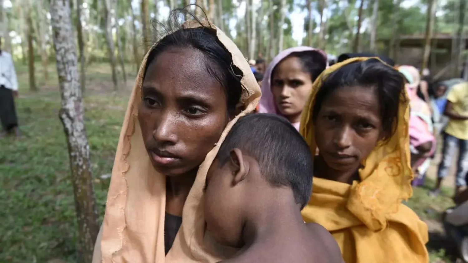 Rohingya Muslim refugees wait in line for relief supplies in Bangladesh's Balukhali refugee camp on September 15, 2017. (AFP)