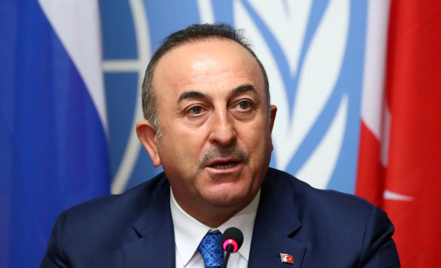 FILE PHOTO: Turkish Foreign Minister Mevlut Cavusoglu attends a news conference in Geneva, Switzerland, October 29, 2019. REUTERS/Denis Balibouse/File Photo
