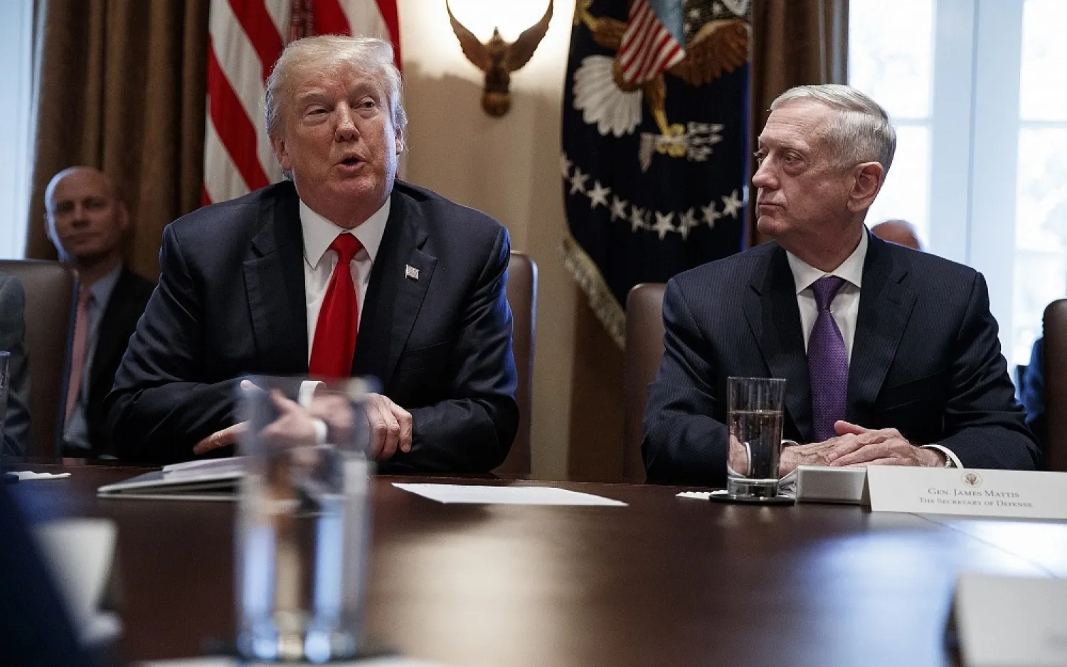Then US Defense Secretary Jim Mattis, right, listens to US President Donald Trump speak during a cabinet meeting at the White House on January 10, 2018. (AP)