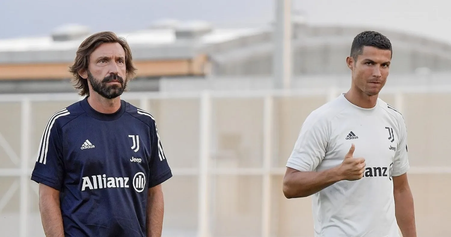 Cristiano Ronaldo (R) and Juventus coach Andrea Pirlo. (Getty Images)