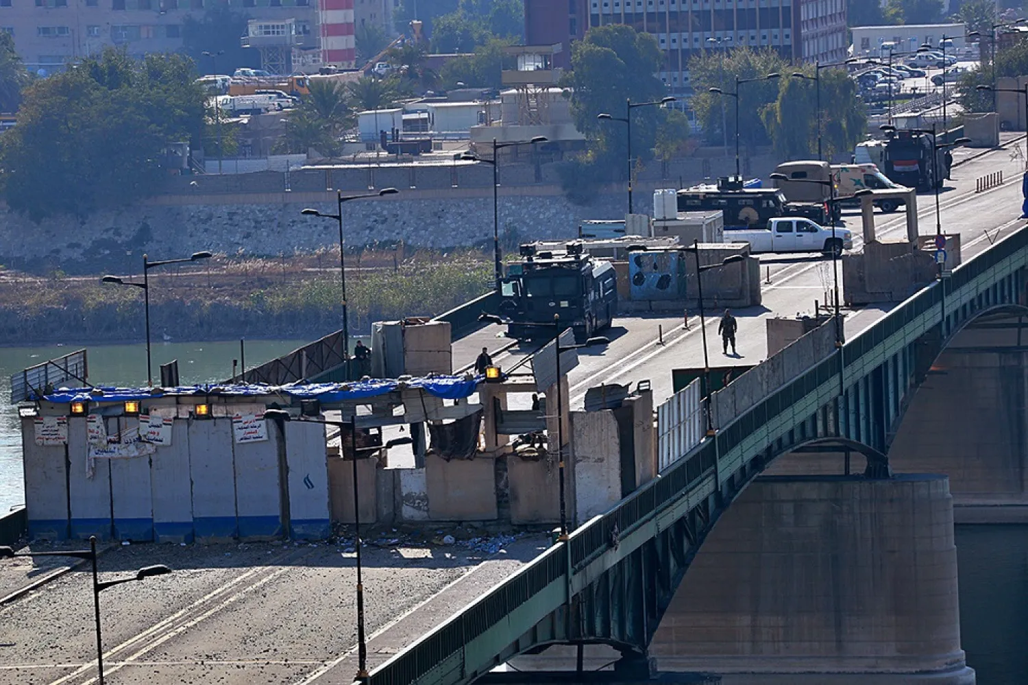 Security forces close a bridge leading to the Green Zone government areas in Baghdad, Iraq, in February. (AP)