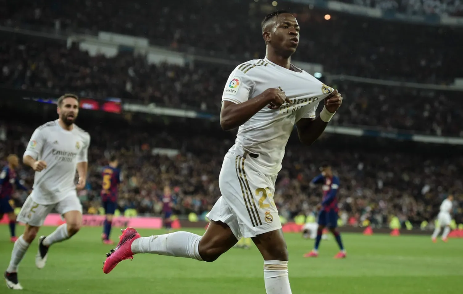  Vinicius Junior celebrates after scoring for Real Madrid against Barcelona at the Bernabéu earlier this year. Photograph: Óscar del Pozo/AFP via Getty Images
