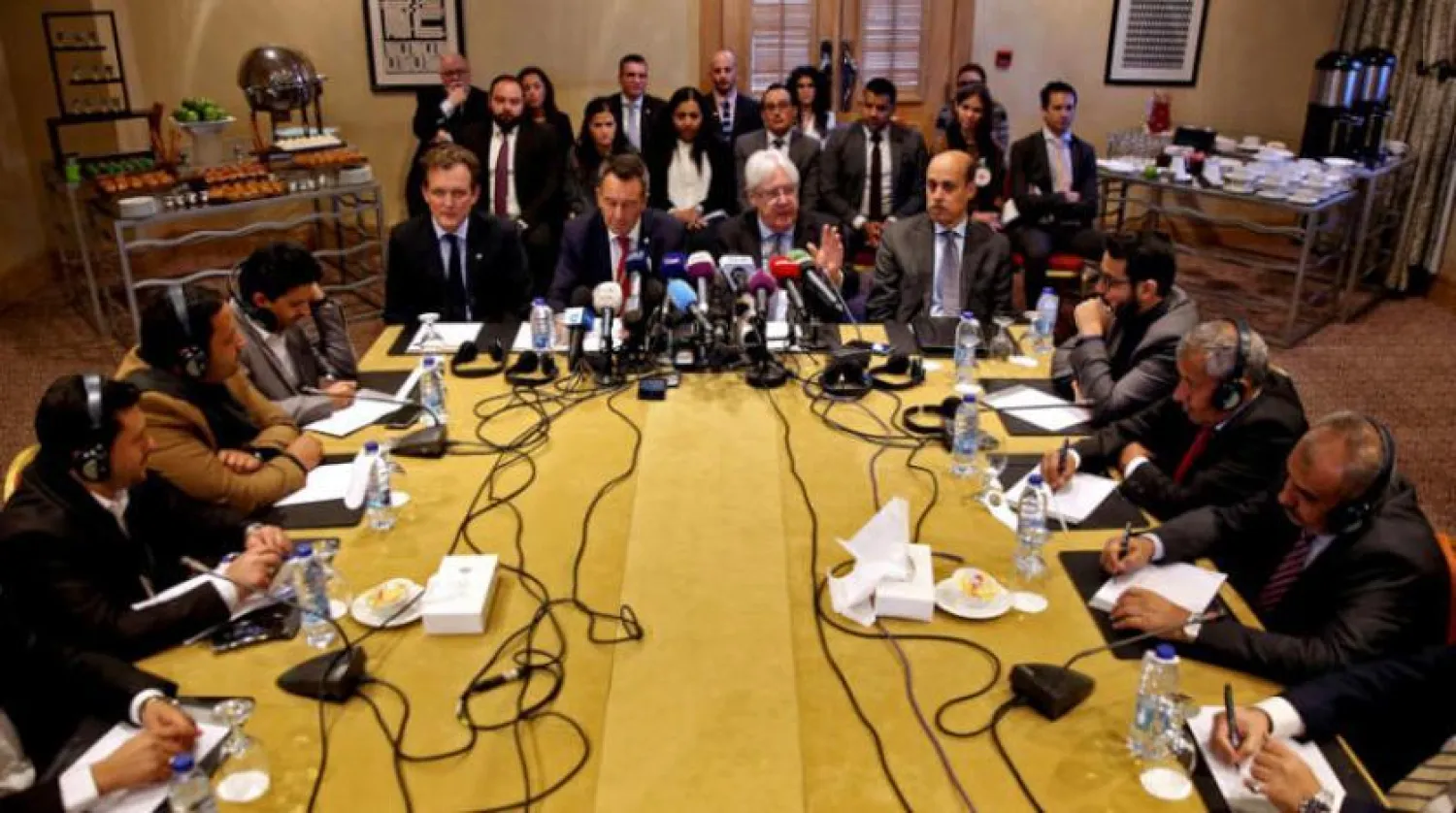 UN envoy Martin Griffiths, to his right, head of the delegation of the Red Cross committee in Sanaa, when they attended talks between the government and Houthis in Amman. Getty Images