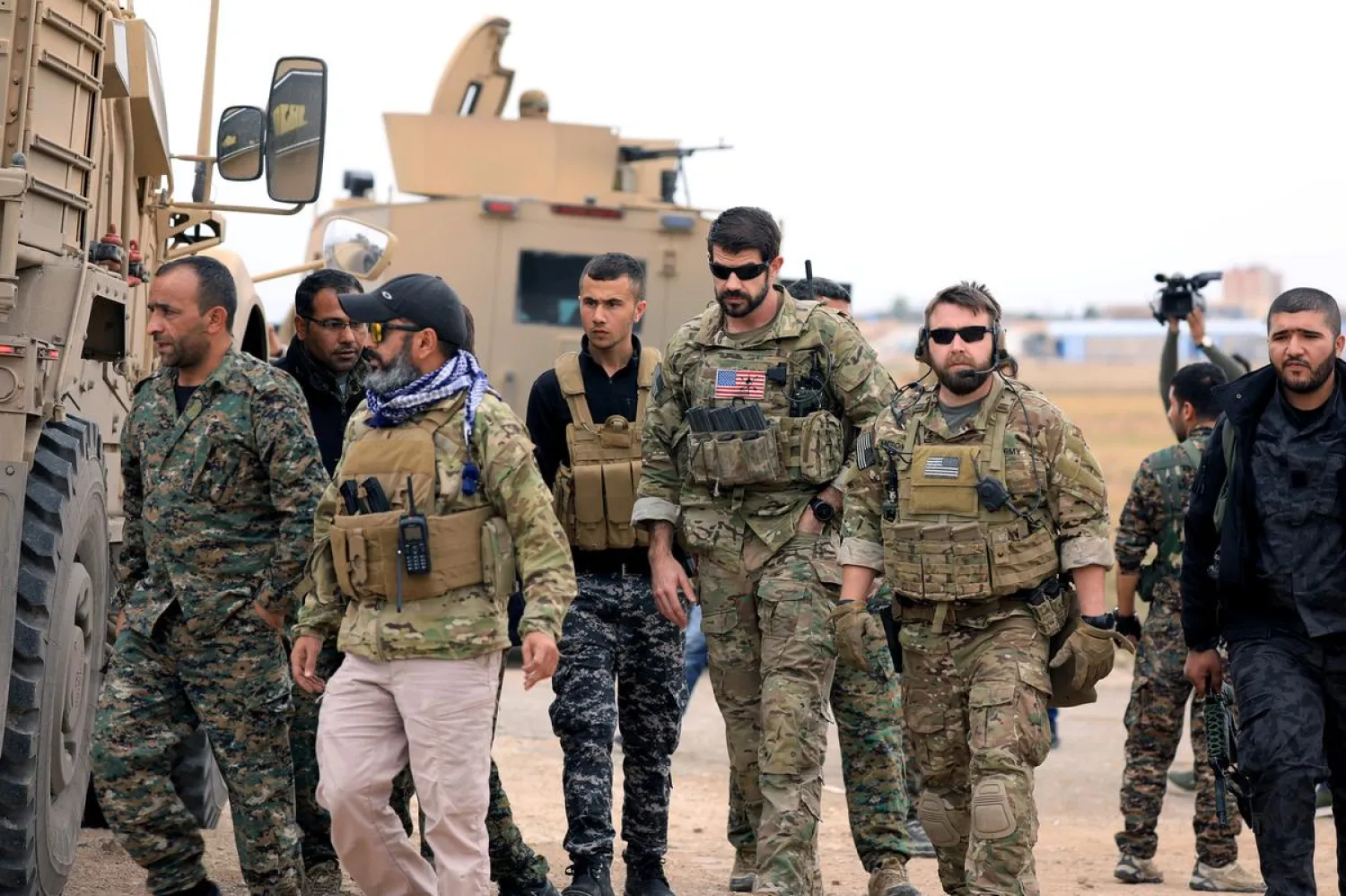 SDF and US troops in Hasakah, Syria. Reuters 