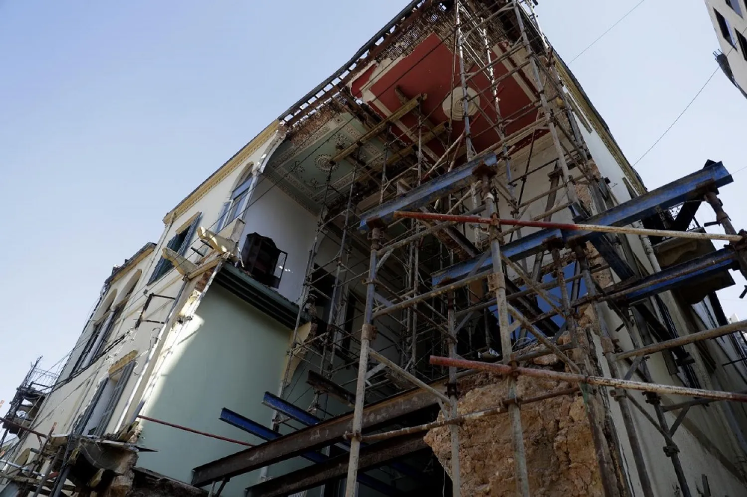Scaffolding supports a dislocated ceiling in a damaged traditional Lebanese building affected by the Beirut blast, in the Gemmayzeh neighborhood, on August 26, 2020. (AFP)