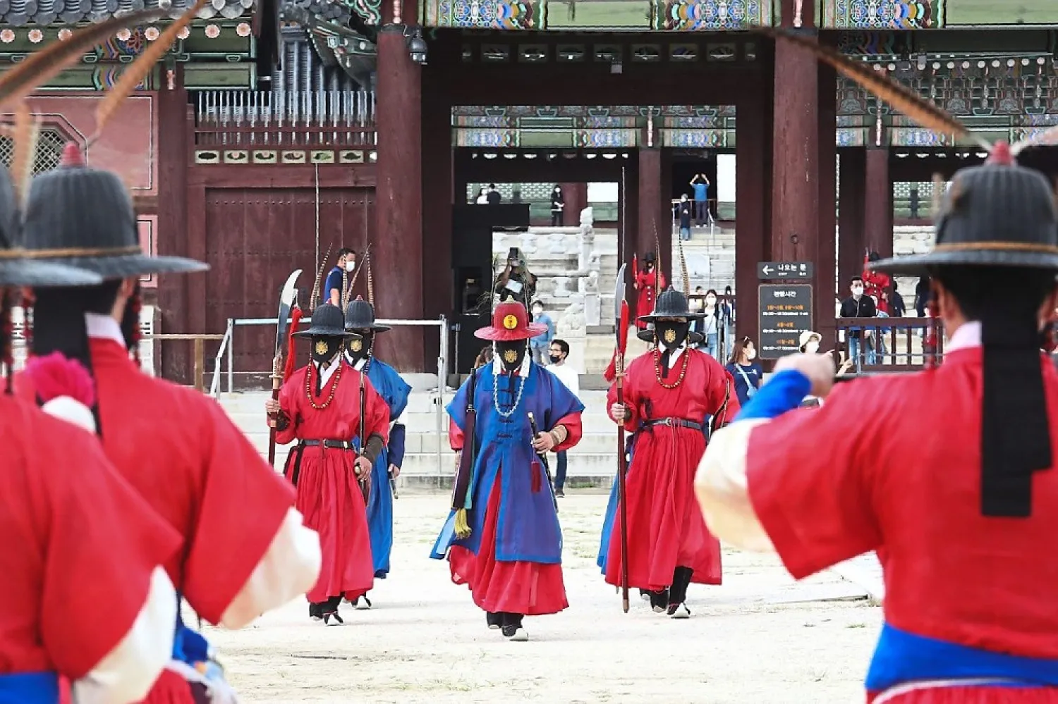 Imperial guards wearing face masks as they patrol in front of Gyeongbok Palace in Seoul. (AP)