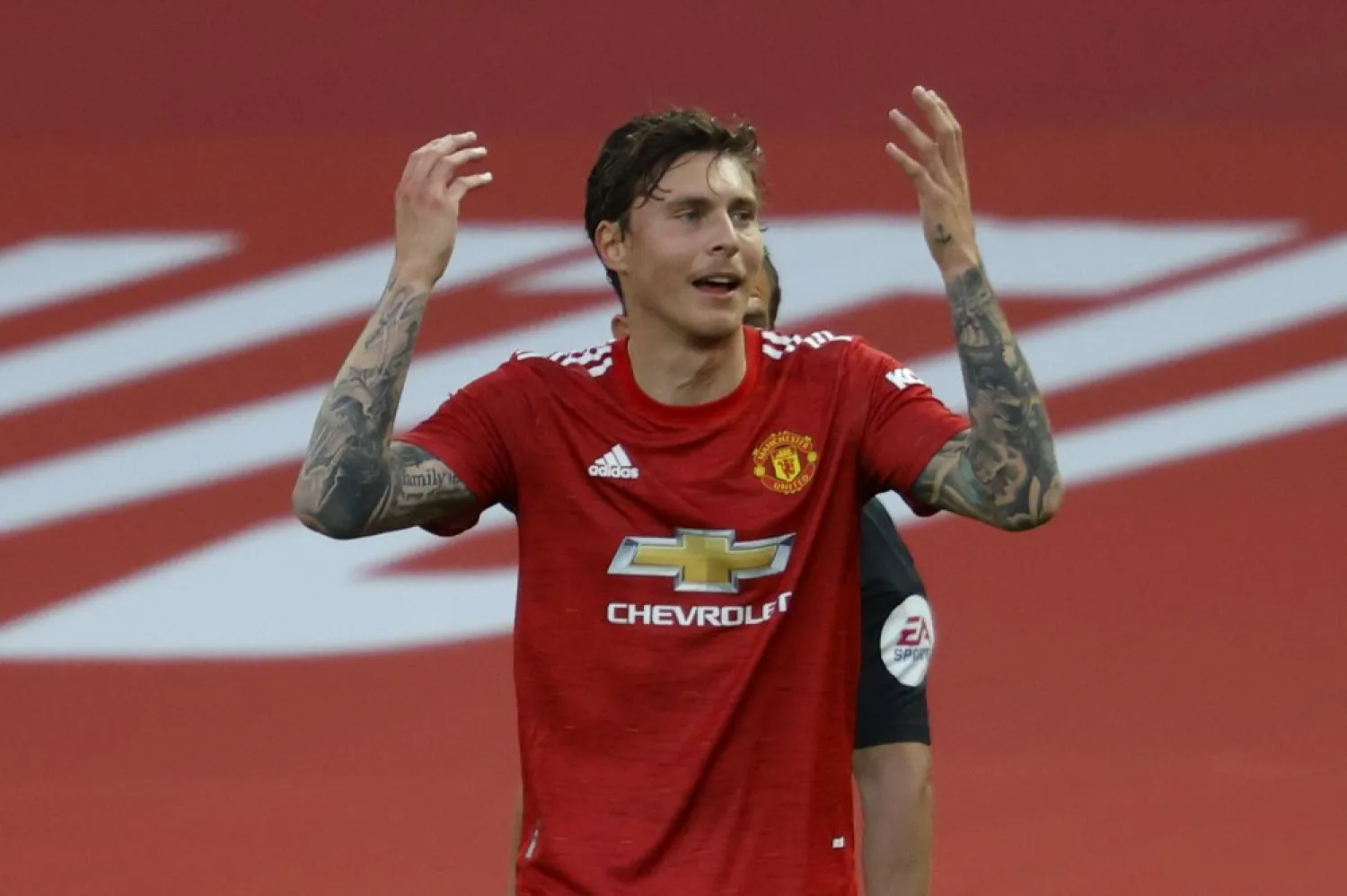 Manchester United's Victor Lindelof reacts after a penalty is awarded to Crystal Palace during the Premier League match against Crystal Palace at the Old Trafford, Sept. 19, 2020. (AP)