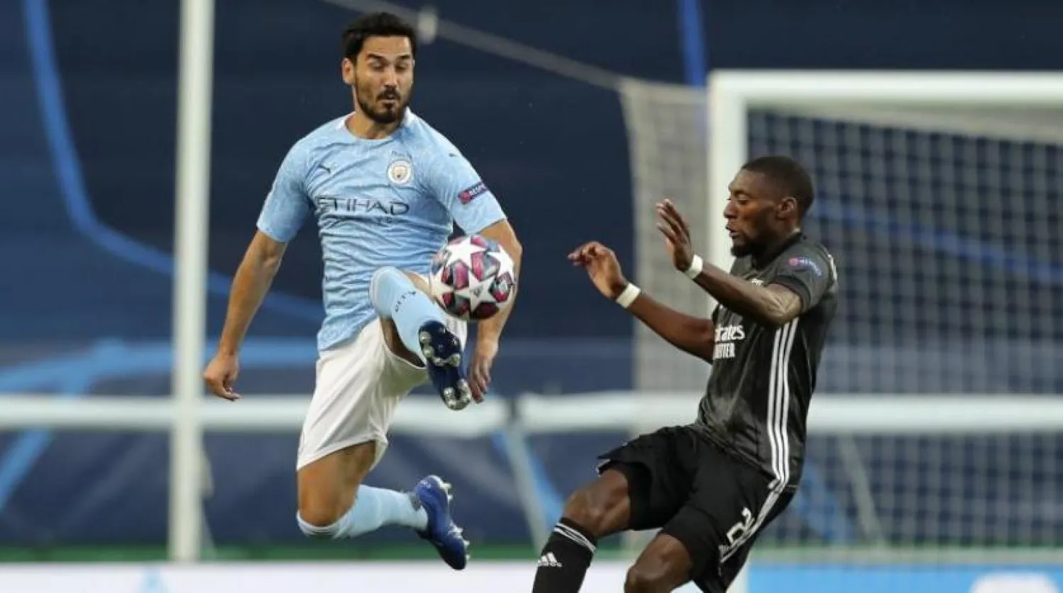 Manchester City forması giyen İlkay Gündoğan, Lyon ile oynan Şamiyonlar Ligi maçında (AP)
